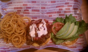 A Smashburger and skinny Haystack onion rings. Photo by Todd Harrison Yaskal.