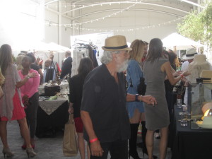 The hub bub in the gitfing area of the event. Do you notice Tommy Chong, stylin' with his new fedora? Photo by Karen Salkin.