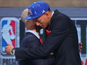 Isaiah Austin embracing Commissioner Silver at the 2014 NBA Draft.  