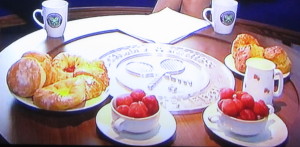 The lame Breakfast at Wimbledon fare.  The strawberries and scones are correct, but the donuts and croissants (on the left) are pathetic. Photo by Karen Salkin.