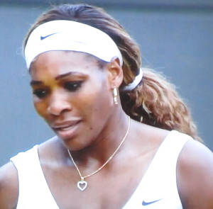 Serena Williams, almost crying because she's losing.  Or is it because her fake brows are wearing off? Photo by Karen Salkin.