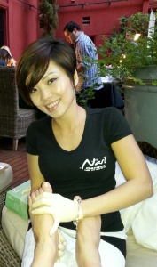 Emily Tran of Nail Garden working on a satisfied customer.  Photo by Alice Farinas.