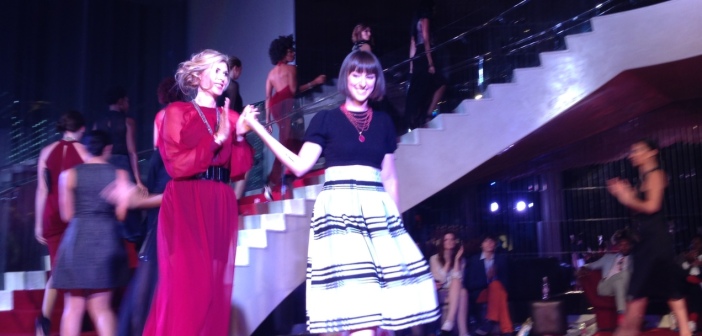 Designer Bri Seeley, on the right, taking her bow at the end of her segment of the show.  Photo courtesy of Mannfolk PR.