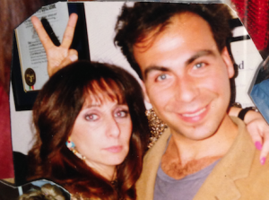 Karen Salkin and Taylor Negron.  Photo by Jeanine Anderson. This was taken   at one of my birthday extravaganzas, back in the day.  It's been hanging in my living room for many years now, yet I never noticed the fingers he was holding above my head until last night!