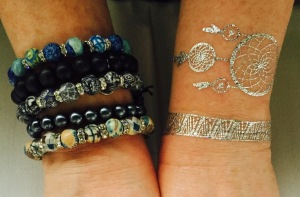 Which arm has the real bracelets?  Photo by INAM staff.