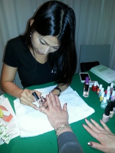 Nikki working on some fabulous hands and nails! Photo by Alice Farinas.