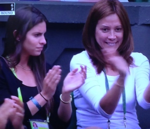 Does Christina McHale's sister (on the left) look happy to you when Christina won the first set? I don't think so.  Photo by Karen Salkin.