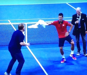 Novak Djokovic, entertaining the crowd after one of his wins.  Photo by Karen Salkin.