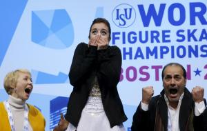The reaction of Ashley Wagner and her coaches, upon learning she won the silver medal.