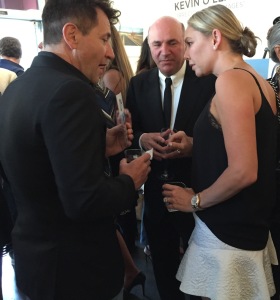 Robert Herjavec, Kevin O'Leary, and Kym Johnson.  I think she's pregnant, which you read here first! Look at her stomach, under her finger, if you can take your eyes off that rock! Photo by Karen Salkin.
