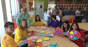 Our gang of artists: (l to R) Leni, Kelley, Bernie, Flavia, Jessie, Alice, Karen.  Can you tell who loves painting the most?! 
