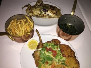 (Clockwise, from left)  French fries, halibut, spinach, veal milanese. Photo by Karen Salkin.