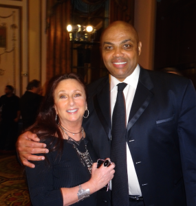 Karen Salkin (the extreme heat is what happened to her hair that day) and Charles Barkley.  But look at the size of Charles' hand!  It's bigger than Karen's whole head! Photo by Lauren Clarke-Bennett.