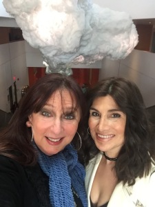 Karen Salkin and Alice Farinas in front of the weird cloud-like structure in  the lobby of Walt Disney Concert Hall.  Wonder what Karen is thinking! Photo by Karen Salkin.