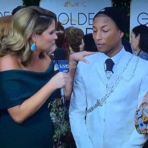 Goony Jenna Bush Hager, with her hand on yet another celebrity's shoulder.  (In this case, Pharrell.)  How creepy!  Photo by Karen Salkin.