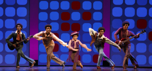 The "Jackson Five," with CJ Wright in the center, playing Michael.  Photo by Joan Marcus.