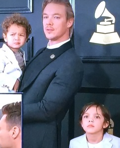 Diplo and his kids, (with a cameo by Ryan Seacrest's ear.) Photo by Karen Salkin.