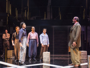 The defendants with their lawyer, played by Brian Abraham. Photo by Craig Schwartz.