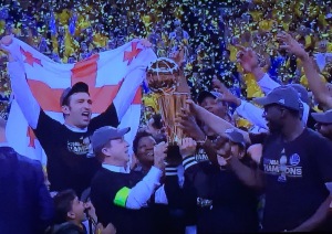 As you can see, Kevin Durnat's mother pushed her way to the front of the celebration on stage.  The team (and the woners and coaches) should have been the only ones to hoist the trophy, not someone's MOM, for goodness' sake!!! Photo by Karen Salkin.
