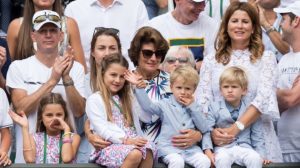 Roger's two sets of twins, with his mom in the middle and his wife on the right.