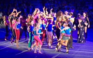 The fun closing number.  Laurie Hernandez is on the front right, with the little girl on her back. Photo by Karen Salkin.