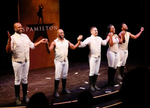 The main cast's opening night curtain call.  (L-R) Dedrick A. Bonner, Wilkie Ferguson III, William Cooper Howell, Zakiya Young, and John Devereaux.  Photo by Ryan Miller.