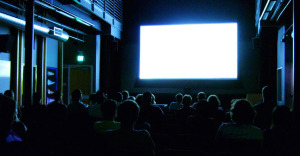 People-watching-movie-screen-blank