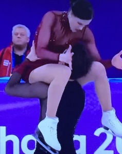 And here's another angle of the weirdo move by Tessa Virtue and Scott Moir. Ice dancers lose points if a feather from their costume falls on the ice, but this lewdness is not only allowed, but rewarded!!!  They knew what they were doing. Photo by Karen Salkin.