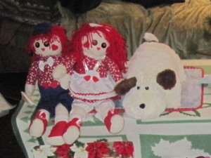 (L-R) Raggedy Andy, Raggedy Ann, and Doggie,  all gifts from Karen Salkin to her mother, to further her fun collection of buddies. Photo by Karen Salkin.