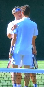 Marcos Baghdatis comforting his opponent who had to default, as referenced above. Photo by Karen Salkin.