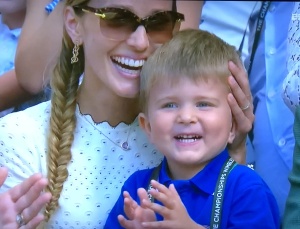 I just love this image of Novak Djokovich's wife and three-year-old son, after his big win.  Photo by Karen Salkin.