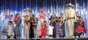 The professional performers dancing with children from the audience.  Photo by Karen Salkin.