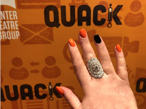 I thought this is a good place to show you that my Halloween nails matched Quacks' bannera and program!  Photo of Karen Salkin's hand by...Karen Salkin's other hand!