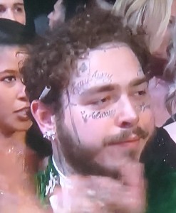 Post Malone, keeping it classy with that cigarette behind his ear!   Photo by Karen Salkin.