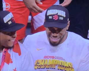 NBA Champion stars, Kyle Lowry and Kawhi Leonard, sharing a moment after their victory.  You better enjoy Kawhi's smile now, because it's very  rarely sighted! Photo by Karen Salkin, as is the big one at the top of this page.