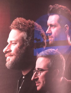 (Clockwise from left) Seth Rogen, Billy Eichner, and John Oliver.  Photo (of the portraits) by Karen Salkin.