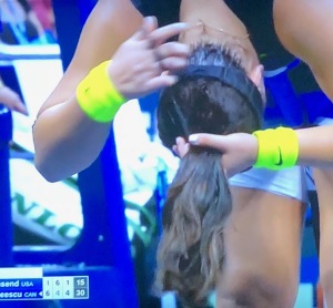 Bianca Andreescu bending over to fix her hair in the middle of the match!  How very calm of her!  Photo by Karen Salkin.