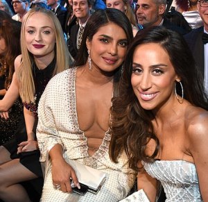 The Jonas wives. Look at how bad Priyanka Chopra's naked middle looks!  Why do show biz women always want to bare their weird chest areas like that?!