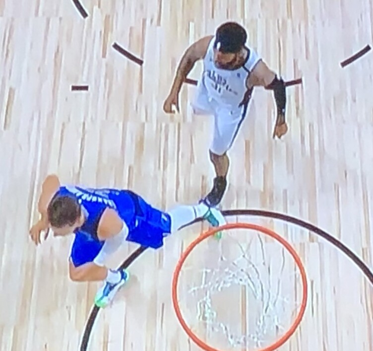 Scumbag Clipper Marcus Morris going out of his way to step on Luka Doncic's already-injured ankle!