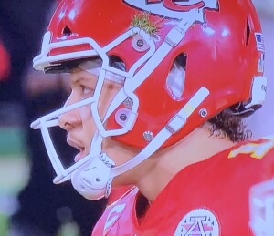 The turf on Patrick Mahomes' helmet, not to mention the intense look on his face, tells you just how down and dirty he was willing to get through the entire game. Photo by Karen Salkin.