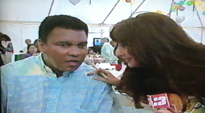 Karen Salkin interviewing the REAL Muhammad Ali back in the day! Photo by Karen Salkin, from the TV screen.