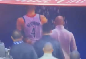 Popcorn being thrown down on Russell Westbrook as he leaves the court in Philly.