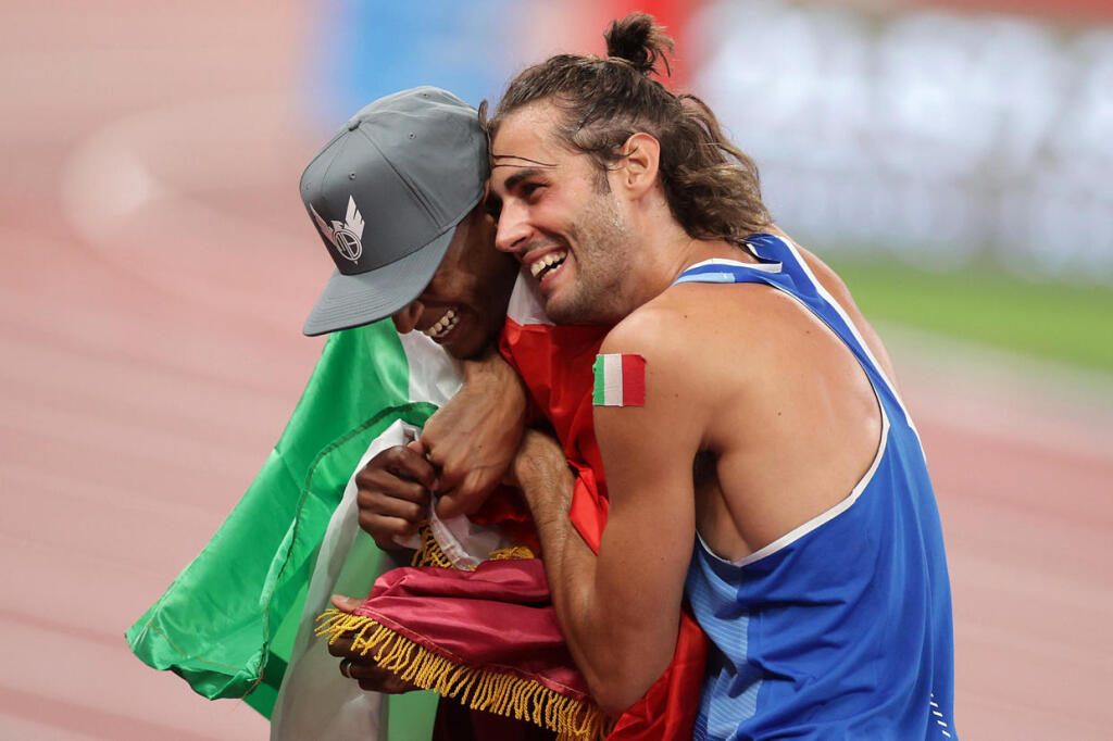 Mutaz Essa Barshim of Qatar and Gianmarco Tamberi of Italy learning they would be sharing the Gold Medal.