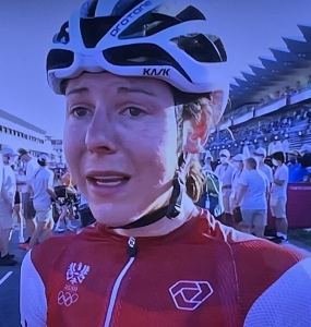 Anna Kiesenhofer after she had won her bike race.  You can't tell by her face whether she had won or lost!  Photo by Karen Salkin, off the TV.