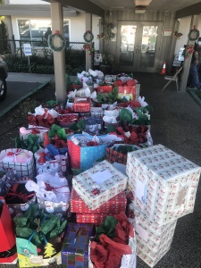 All the presents happily wrapped, awaiting their recipients at a care home last Christmas. This is what YOUR donations will look like THIS year!  All images courtesy of Comfort Companions Inc.