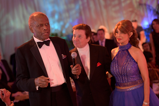 Sidney Poitier with Bobby and Brigitte Sherman at their charity gala at the end of 2015. Photo by Jason Kempin.