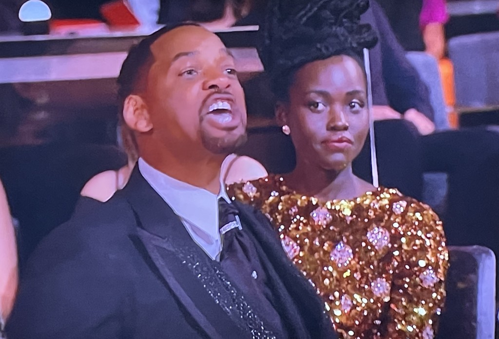Will Smith, cursing Chris Rock out once he got back to the his seat in the audience.  Note the shock on the face of Lupita Nyong'o. Photo by Karen Salkin.