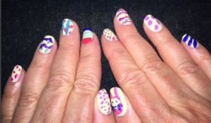 This one is more advanced, of course. It's Karen Salkin's Easter nails. She hand-painted each one with a different original design! Photo by Mr. X.