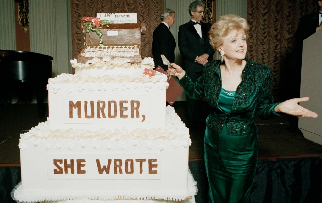 Angela Lansbury at her Murder, She Wrote fete. Notice that the top of the cake is a typewriter!
