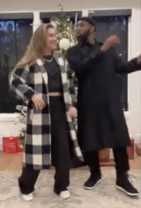 The Bosses doing one of their famous dance videos in front of their Christmas tree just two days before the tragedy. (It's blurry because I took it off the video.)